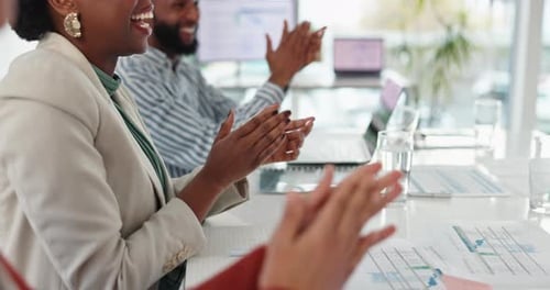 Colleagues Applauding at a Corporate Conference