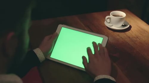 Drinking Coffee Tea Close Up of Business Man's Hand Using Green Screen Tablet Computer Pc