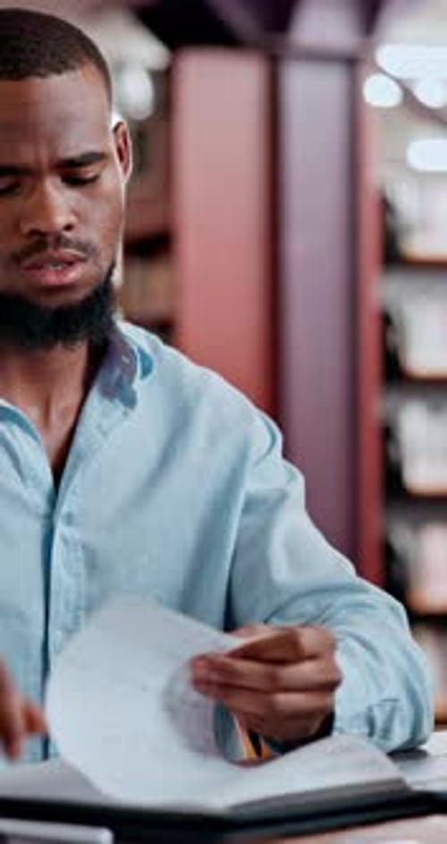 Frustrated man, student or paper with stress at library for project, assessment