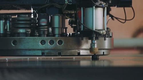 Close Up Automated Machine Manufacturing. CNC Machine Produces Metal Detail on Factory