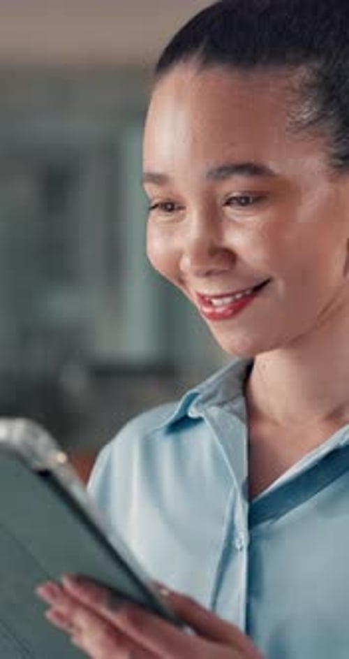 Tablet, happy and business woman in office for reading feedback, research and article review