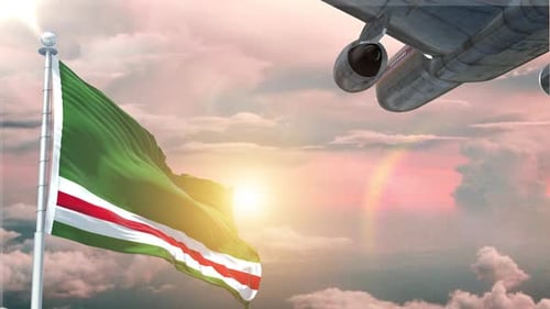 Waving Flag and Airplane Flying in Sunset Sky