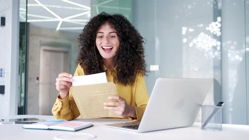Excited Woman Receiving Good News at the Office