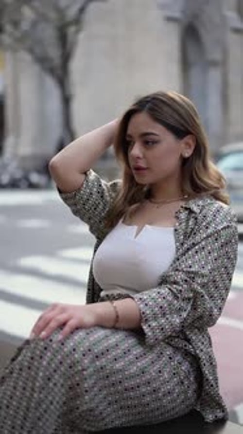 A Fashionable Confident Woman in a Stylish Outfit in a Modern City Setting