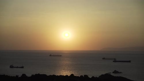 Large Cargo Ships at Sea Sunset 4K