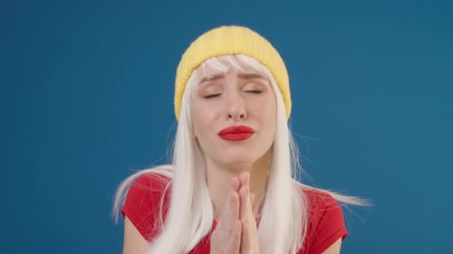 Woman Close Up with Praying Expression