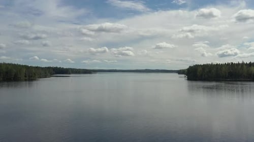 Beautiful aerial footage over lake during summer.