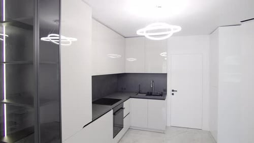 Modern Kitchen Design Features Sleek Cabinets Minimalist Decor and Bright Lighting in a Contemporary