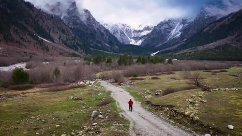 Man Going Towards the Mountain