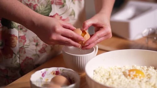 Cracking Eggs for a Baking Recipe
