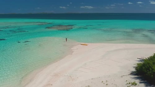 Girl with Kayak Relax on Wild Tropic Island Beach