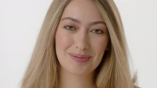 Smiling Blonde Woman in a Beauty Close Up