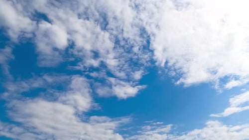 Lovely soft clouds flying with the wind quickly.