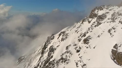 Aerial View of Snow Capped Mountain Peak. British Columbia, Canada.