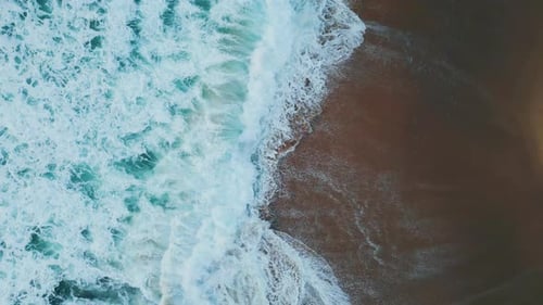 Stormy Ocean Waves Meeting Sand Tropical Beach Making White Foam Aerial View