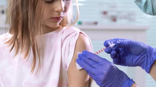 Child Receiving an Injection at the Doctor's Office