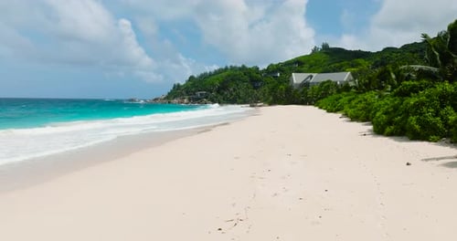 Pristine Sandy Beach with Turquoise Waters and Lush Greenery Seychelles Mahe