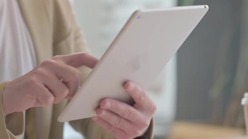 Close up of Male Hand Using Tablet PC