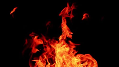 Fire sparks glowing with warm. Fire flame on isolated black background.