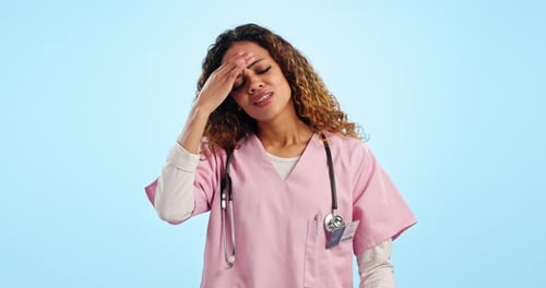 Headache, doctor and woman in studio with medical burnout, stress and tired of healthcare challenge