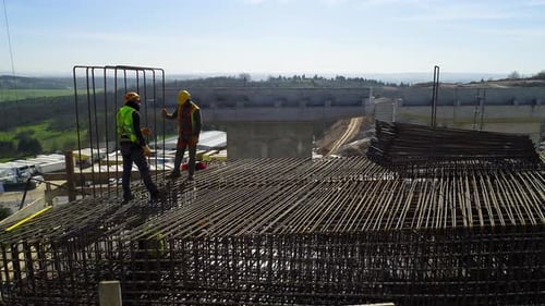 Workers Working in Highway Construction