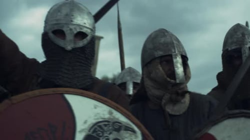 Medieval Soldiers Marching with Shields and Spears