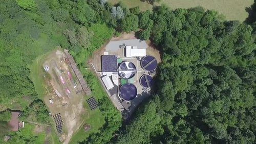 Waste management water treatment facility. Aerial birds eye rising