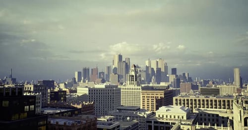 Dramatic Weather Front Casting Shadows on City Towers and Sky