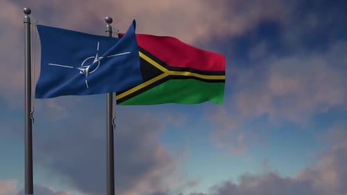 NATO and Vanuatu Flags Waving Against Cloudy Sky