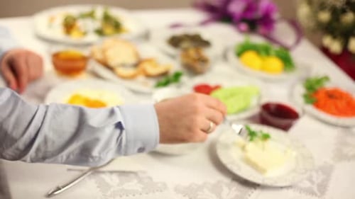 Businessman is Having Breakfast