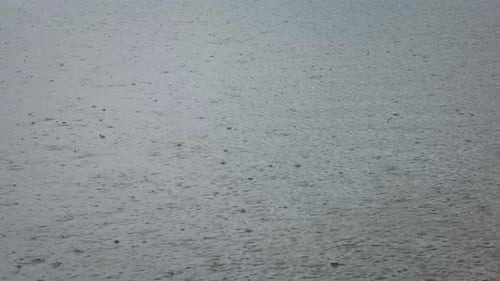 Heavy Rainfall Splashing on Lake surface, Natures weather background
