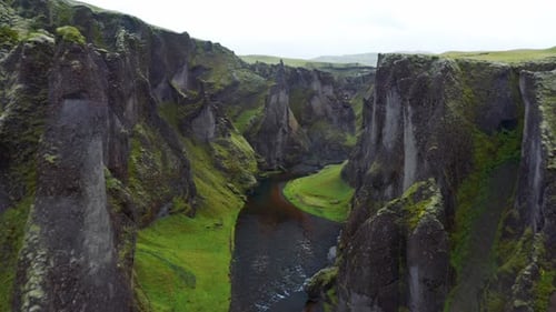 Landscape Of Fjaðrárgljúfur Canyon In South East Iceland - aerial drone shot