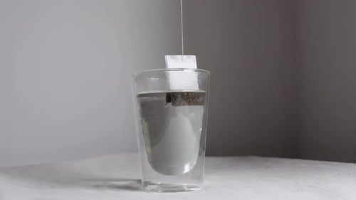 Video of teabag hitting hot water.