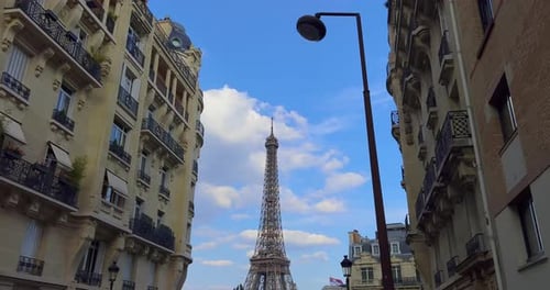 Aerial Drone Distant Sunset View of Tour Eiffel Tower and Seine River Bridge Traffic Cars Driving