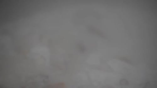 Cooking soup with huge pot in food factory or kitchen.