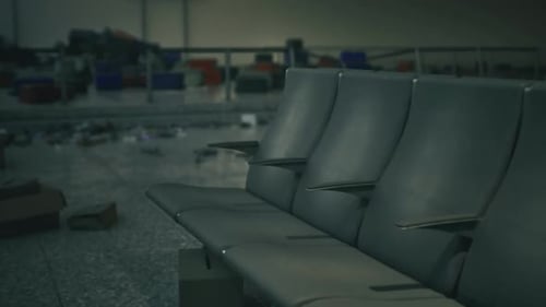 Unoccupied Waiting Zone Featuring Empty Seats and Subdued Lighting Atmosphere