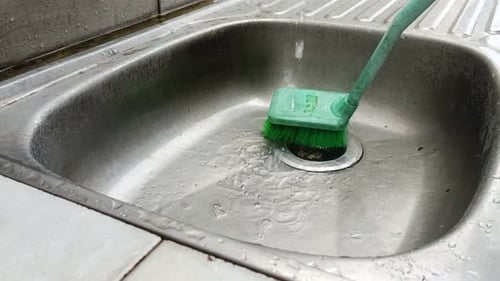 close up cleaning the dishwasher