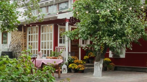 Cozy Backyard with Charming Red House