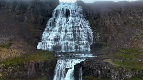 Aerial View of Waterfall in Iceland with People