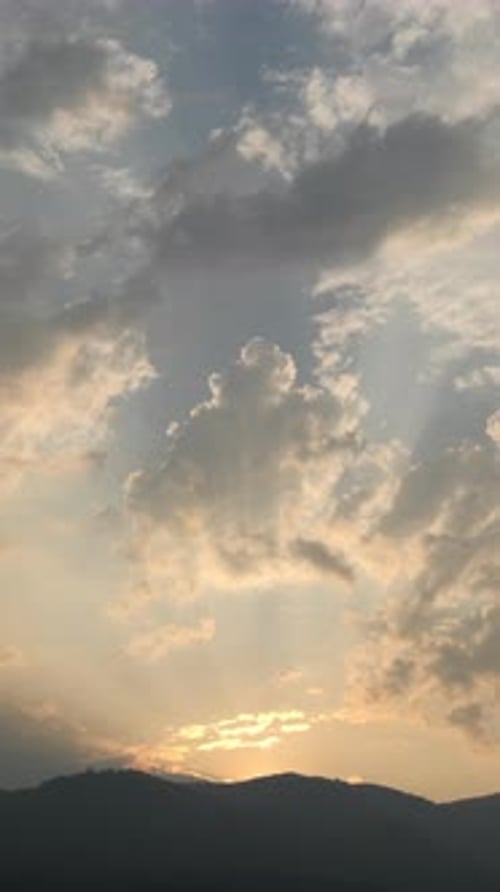 Dramatic Sky with Sun Rays at Sunrise