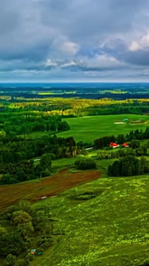Dynamic Rural Landscape with Changing Skies in Tranquil Time-Lapse