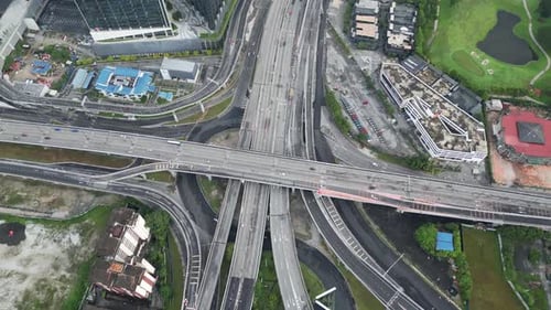 Aerial rotating view of busy car traffic at cheras