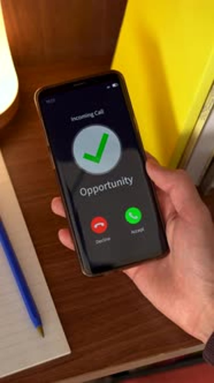 Smartphone ringing with a new opportunity for you. Vertical shot ...