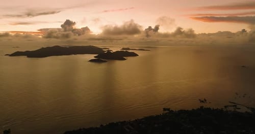 Sunset Horizon with Islands in the Ocean