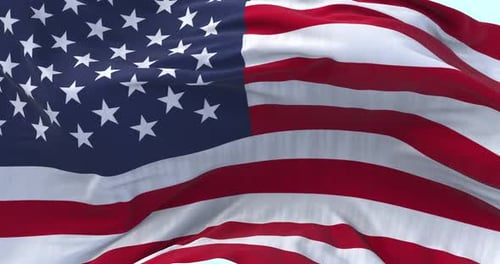Realistic American Flag Waving Slow Motion with Blue Sky Background