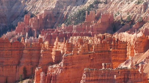 Breathtaking landscapes of Bryce Canyon featuring dramatic red rock formations and towering cliffs.