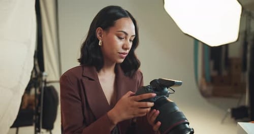 Woman, photographer and face with camera in studio for photoshoot results, catalog or selection