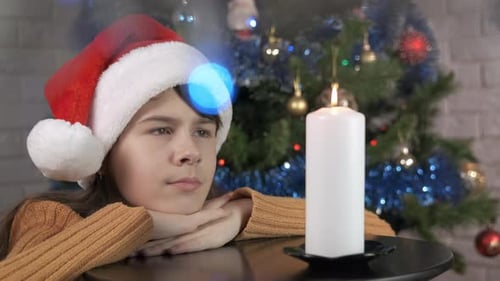 A Young Girl with a Christmas Candle