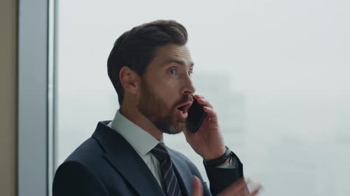 Mad Worker Yelling Telephone at Company Office Close Up