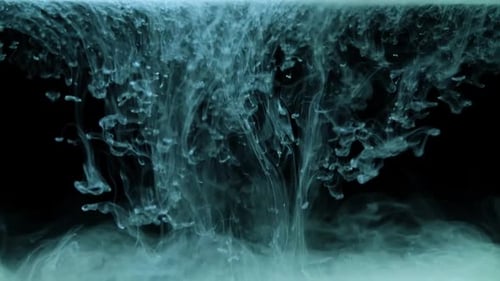 Abstract Ink Plumes Flowing Downward on Black Background